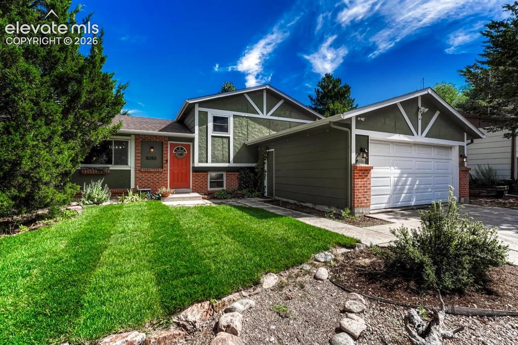 Image 2 of 50: Well maintained and nicely landscaped with mature trees and shrubs for priv