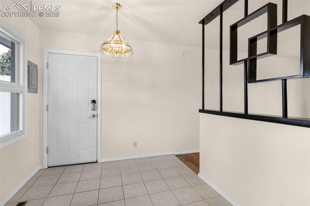 Image 9 of 28: Garage access off the dining area