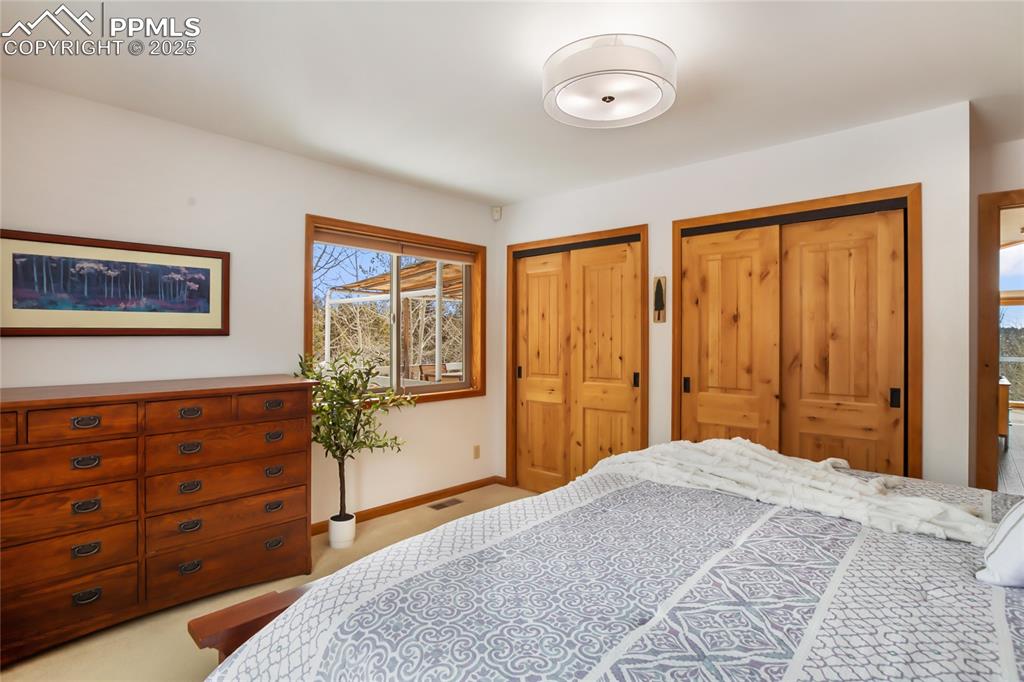 Image 25 of 40: Primary bedroom with large closet space