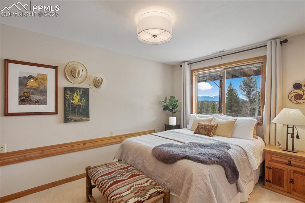 Image 29 of 40: Plenty of space for guests and a beautiful view