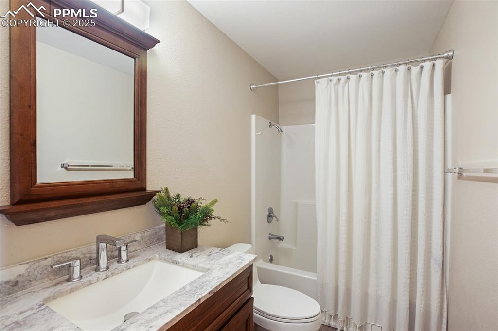 Image 30 of 40: Basement full bathroom