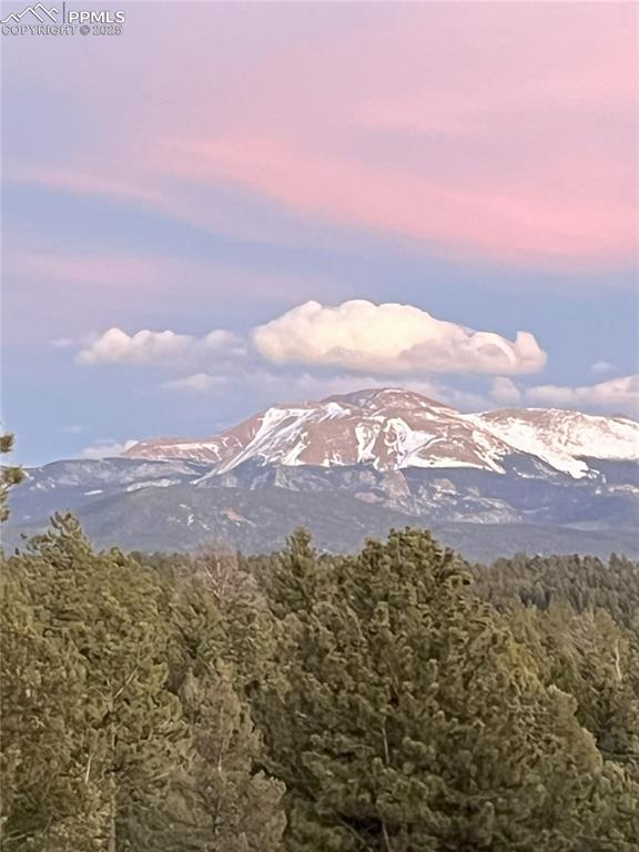 Image 5 of 40: And the most incredible sunsets over Pikes Peak right from your back deck!