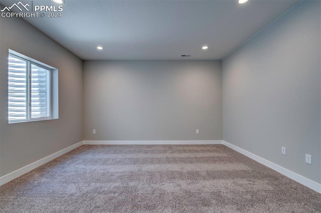 Image 19 of 47: View of carpeted empty room