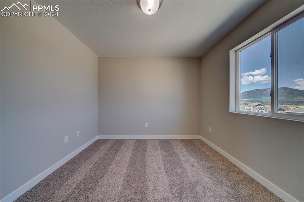 Image 24 of 47: View of carpeted spare room
