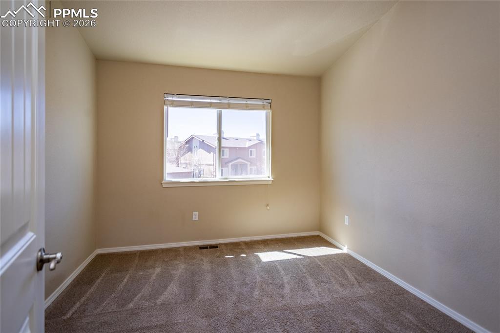 Image 34 of 38: Bedroom