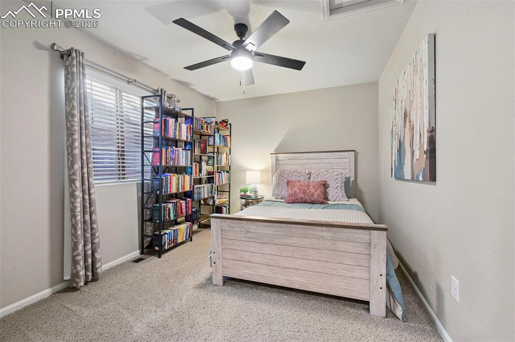 Image 25 of 35: Upstairs, bedroom 3 with step-in closet