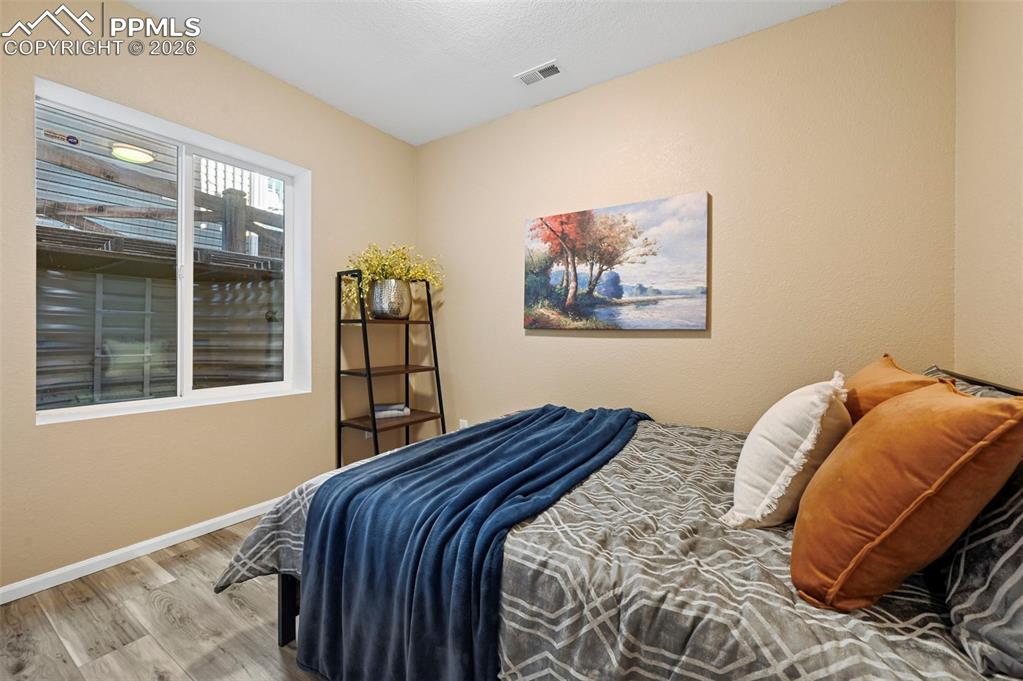 Image 30 of 35: Downstairs, bedroom 4