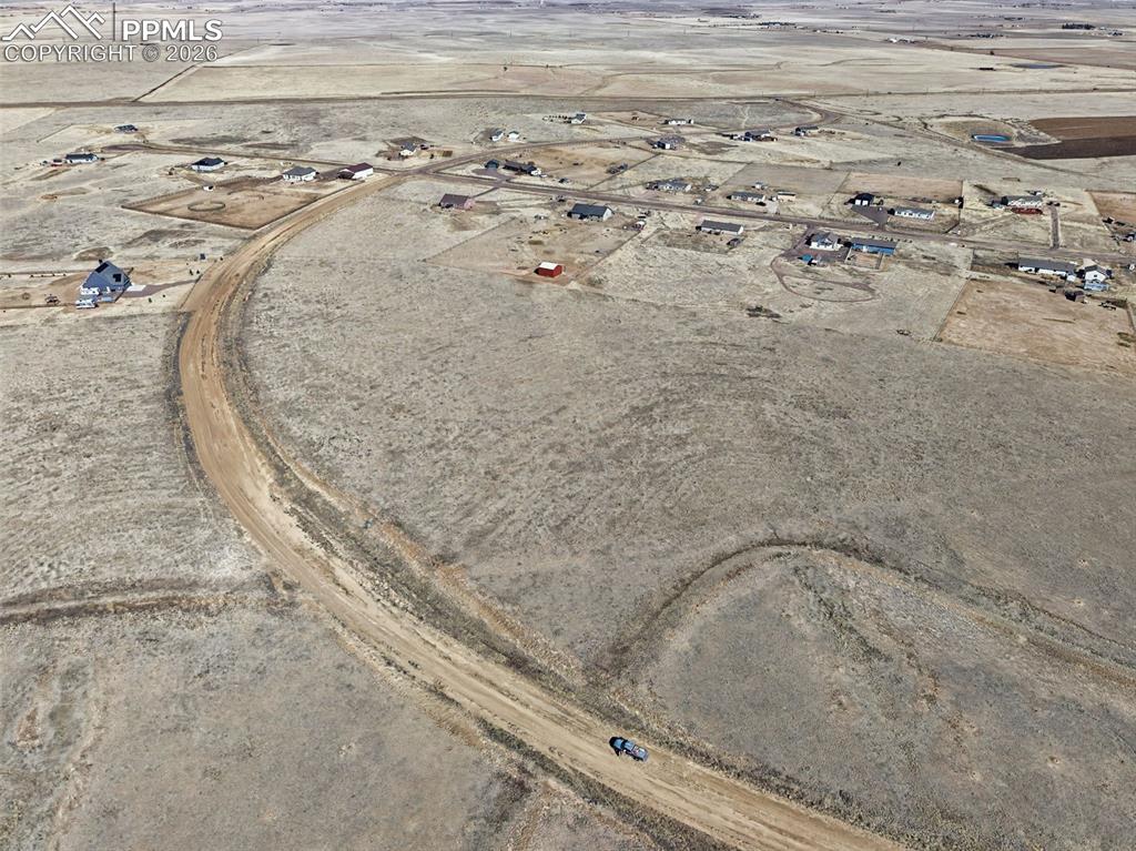 Image 4 of 9: Aerial View – Road Access
Bird’s-eye perspective highlighting the property