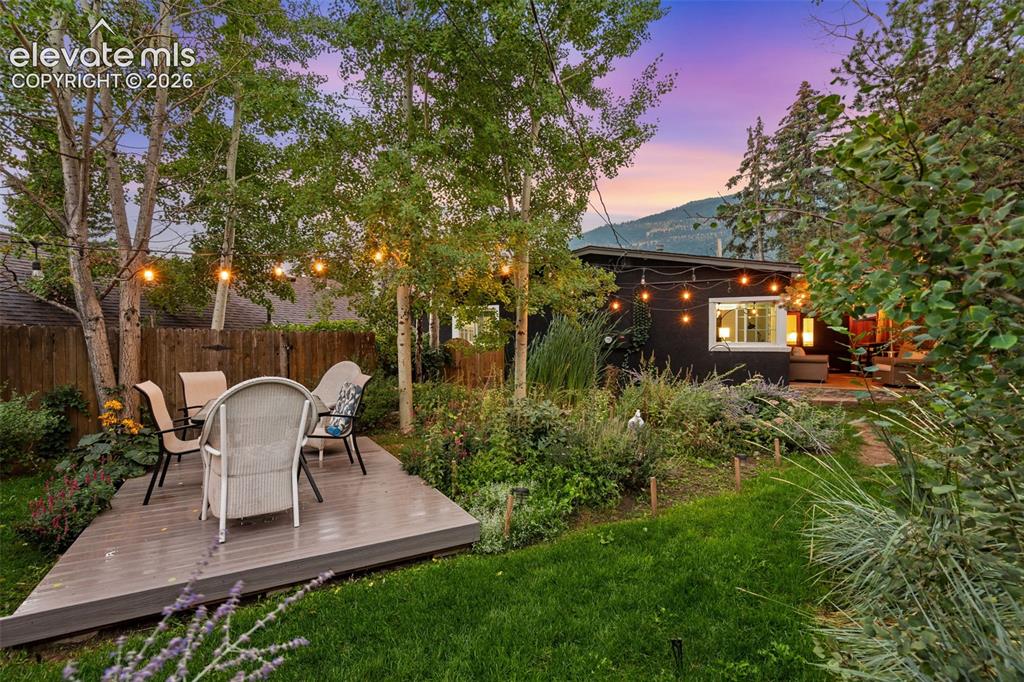 Image 7 of 50: Another deck in the backyard