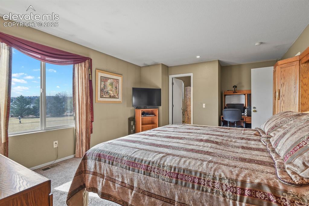 Image 20 of 46: Master Bedroom