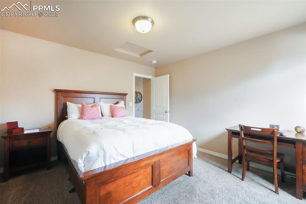 Image 32 of 50: Upstairs third bedroom with walk in closet