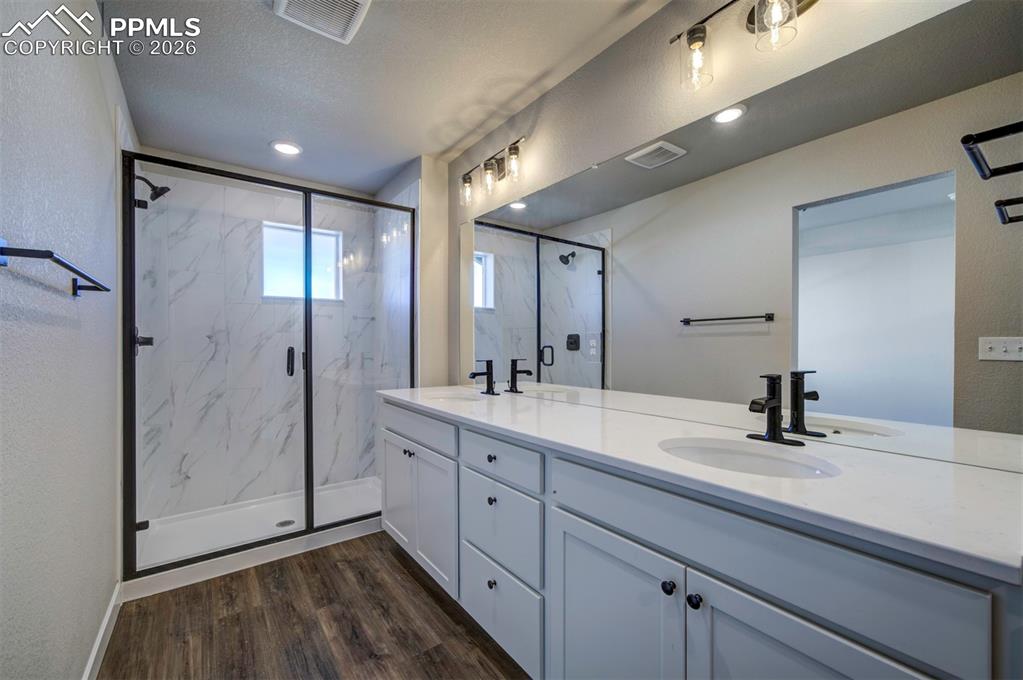 Image 21 of 37: **Pictures are from a previously completed home, not from listed home