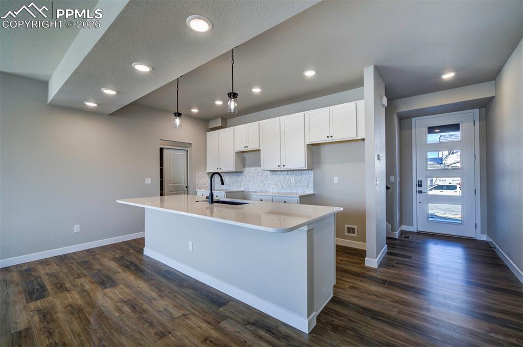 Image 4 of 37: **Pictures are from a previously completed home, not from listed home