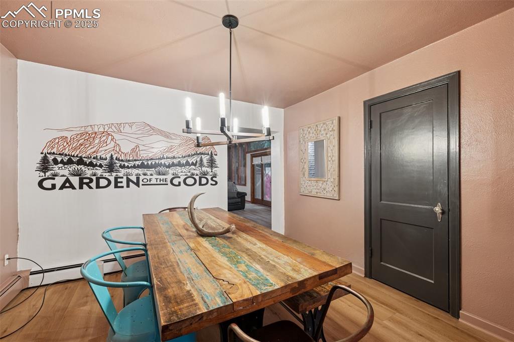 Image 16 of 48: Dining area featuring light wood-style flooring