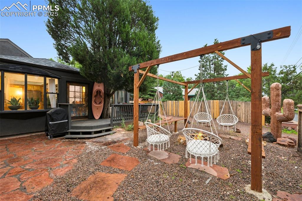 Image 45 of 48: View of patio with a deck