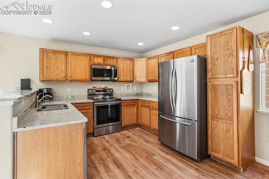Image 10 of 32: Kitchen featuring stainless steel appliances