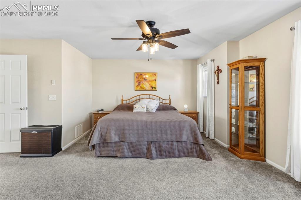 Image 18 of 32: Spacious Primary Bedroom