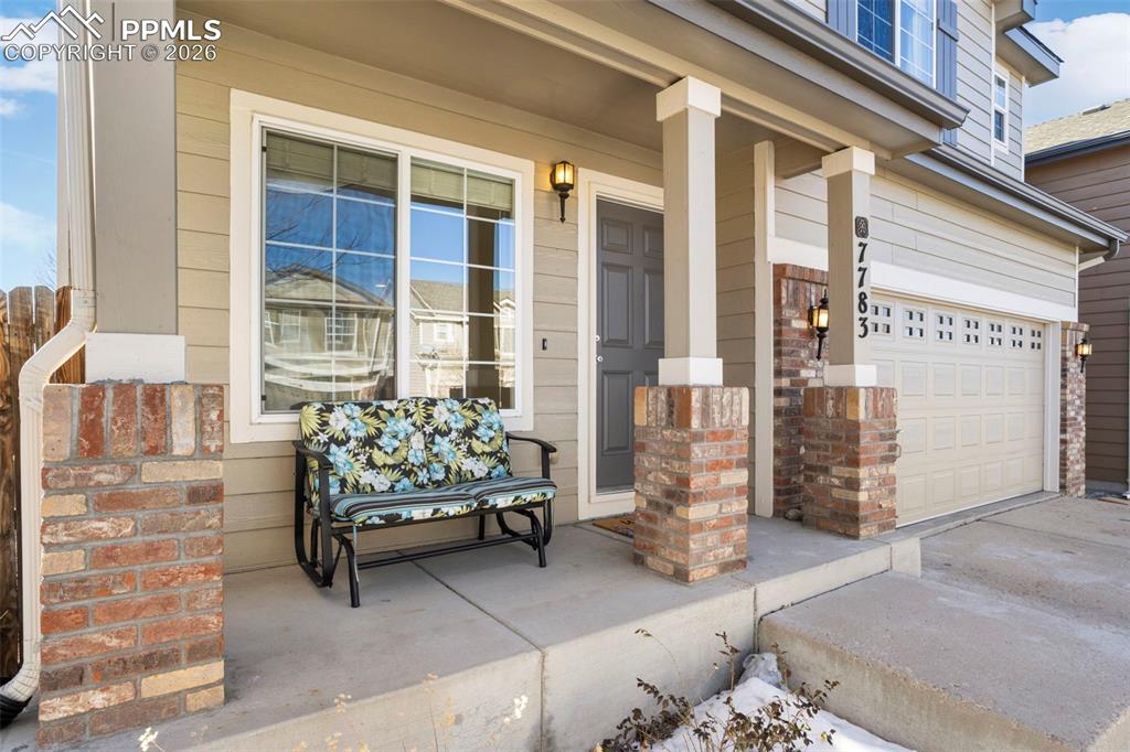 Image 4 of 32: Inviting front porch