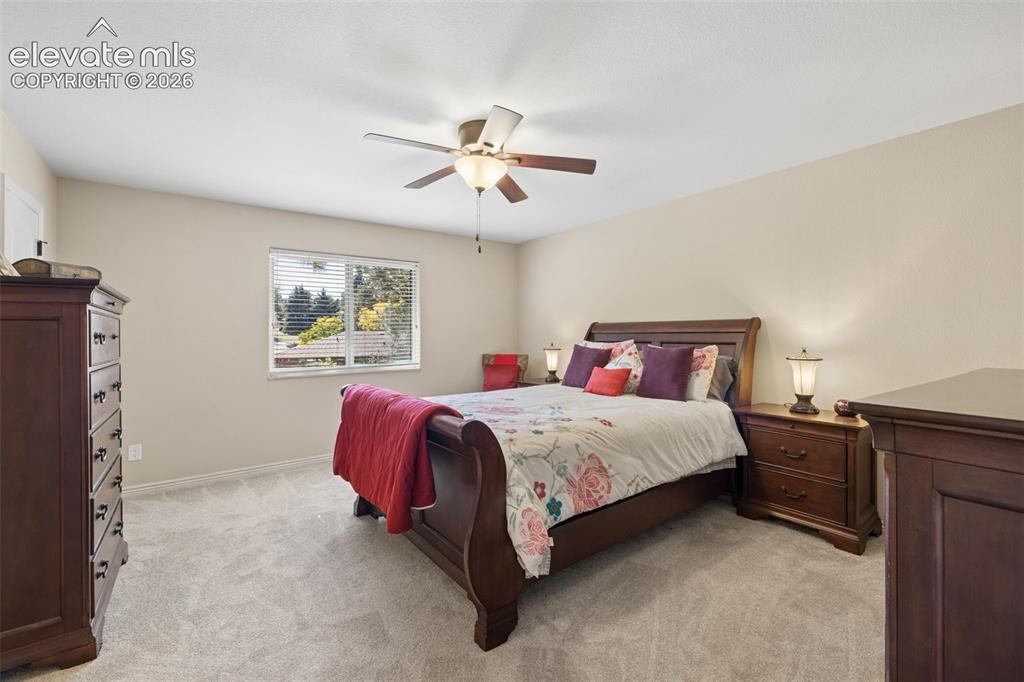 Image 16 of 36: Primary bedroom with en-suite 3/4 bath