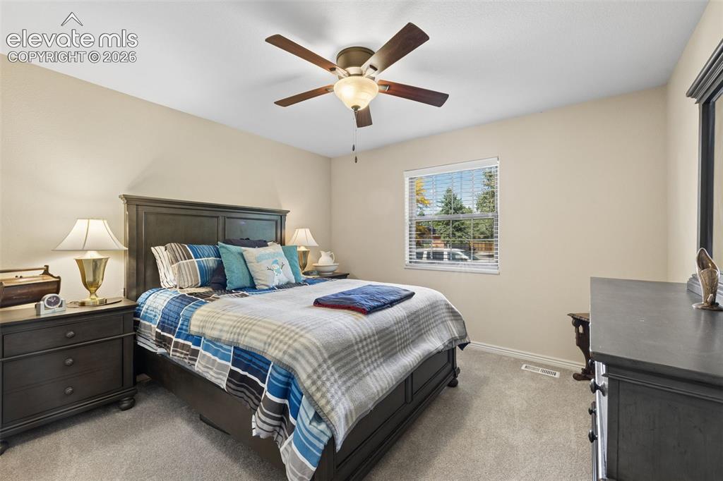 Image 19 of 36: Main level bedroom