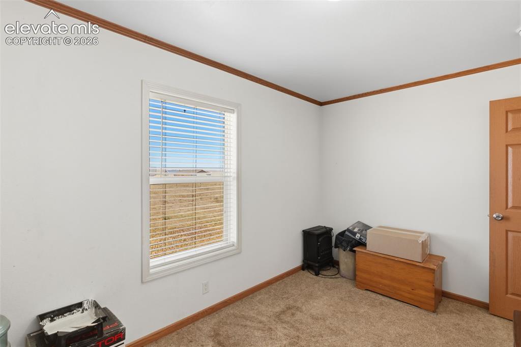 Image 11 of 19: North bedroom