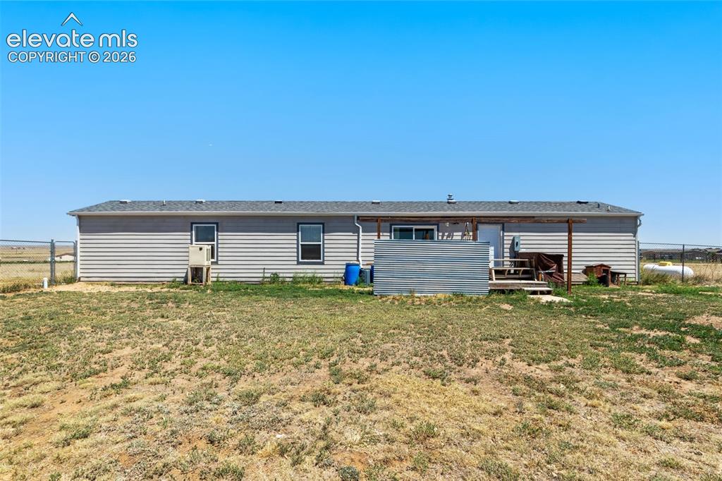Image 19 of 19: rear of home