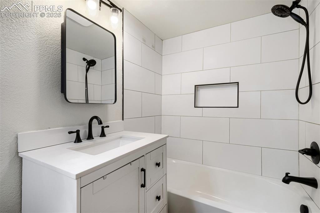 Image 12 of 32: Virtually Staged Bedroom with neutral wall color and carpet flooring
