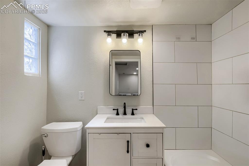 Image 13 of 32: New carpet with neutral-toned wall finishes with white trim throughout