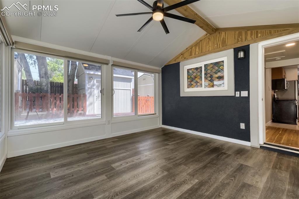 Image 19 of 32: Dedicated laundry area featuring a side-by-side washer and dryer set, reces