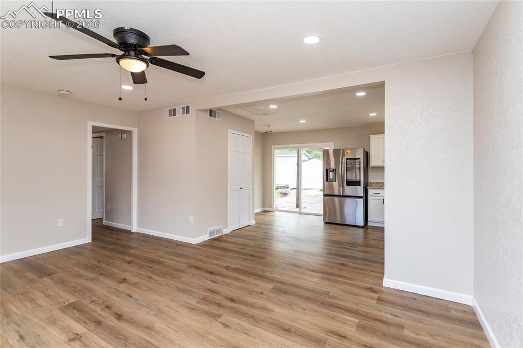 Image 11 of 48: Living room flows into the kitchen and dining space