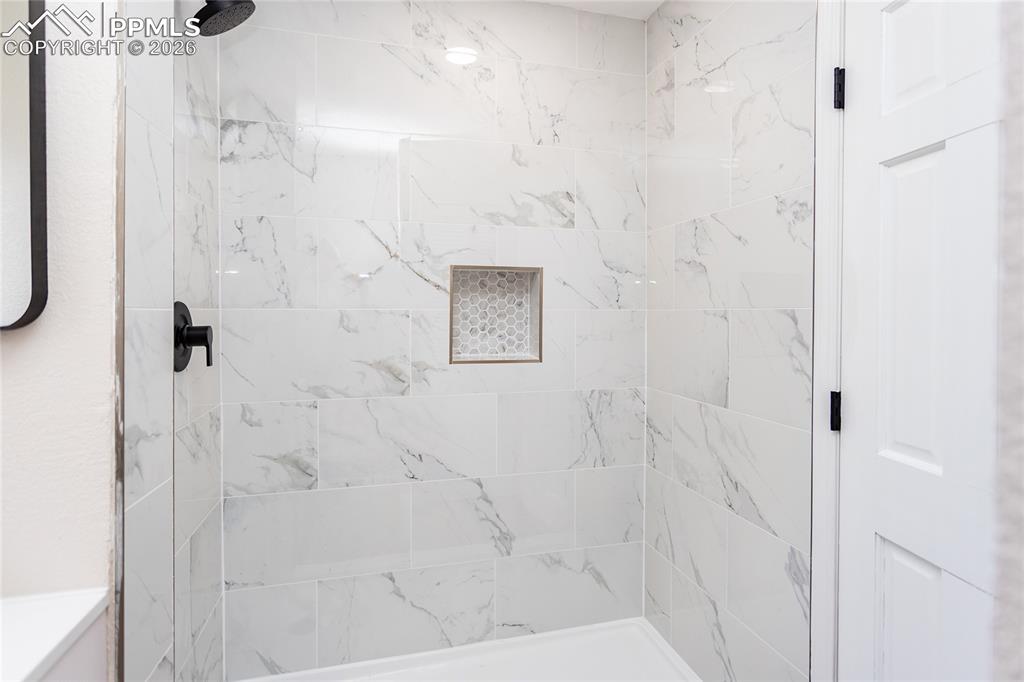 Image 20 of 48: Fresh new tile and hardware