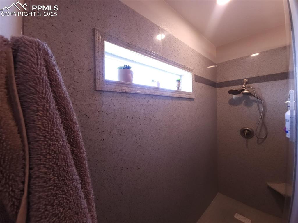 Image 19 of 47: Bathroom featuring a shower