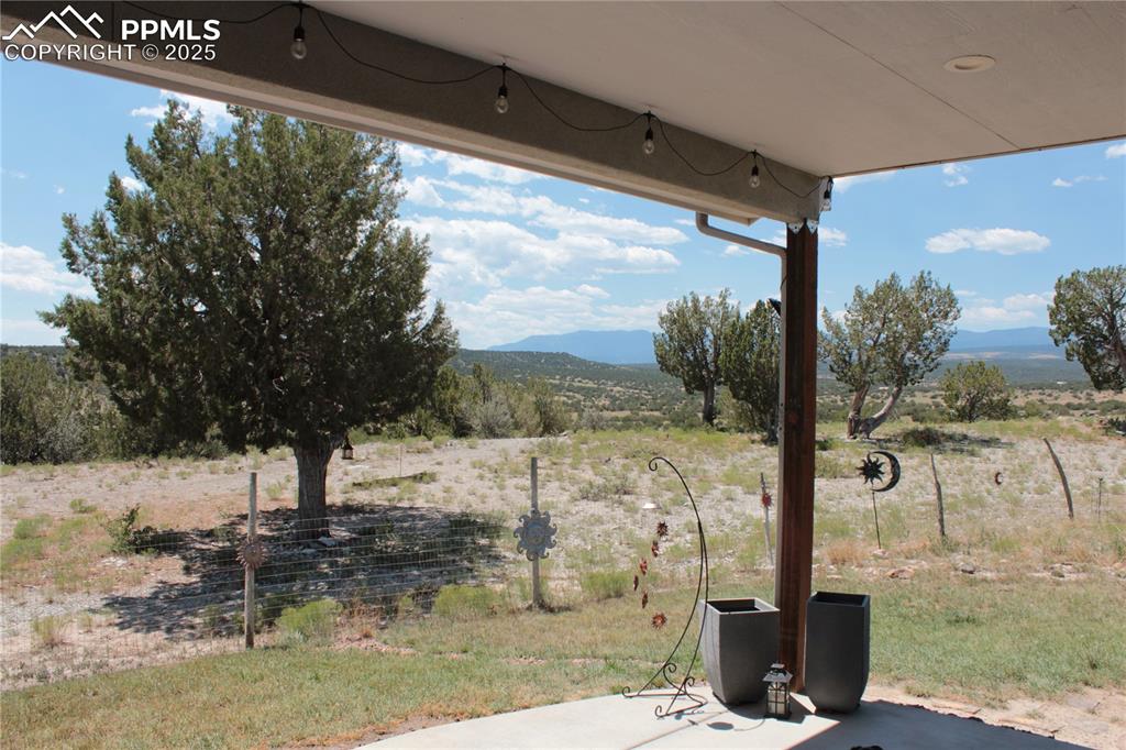 Image 31 of 47: View of patio / terrace with a mountain view and a view of countryside