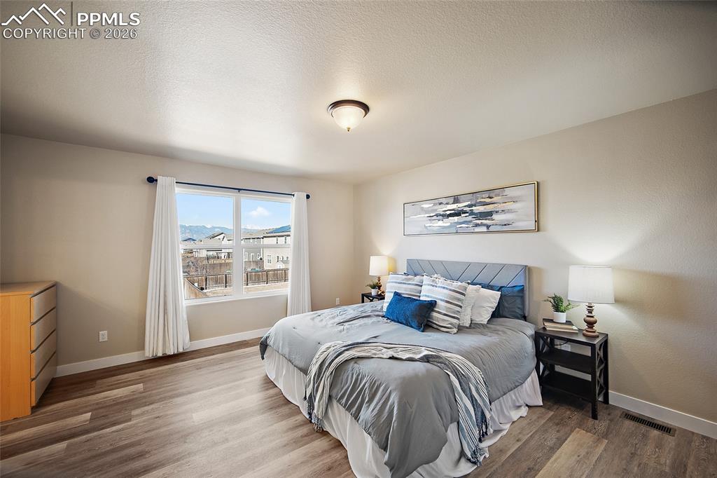 Image 23 of 39: Master Bedroom