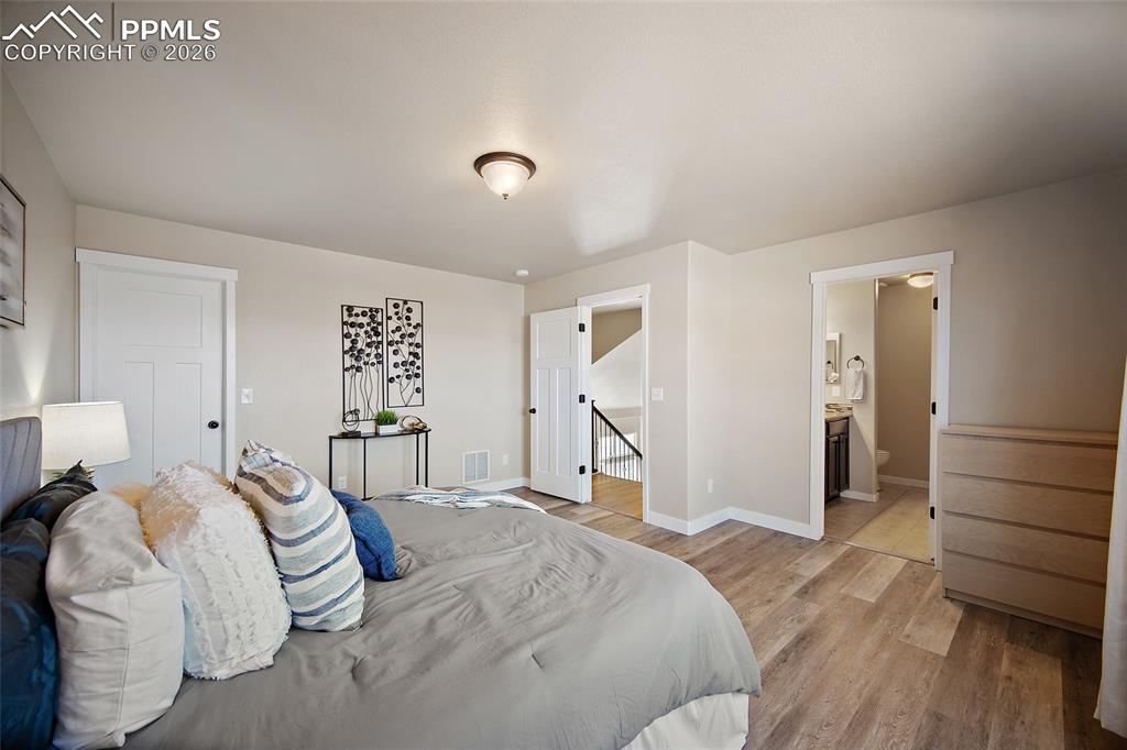 Image 24 of 39: Master Bedroom