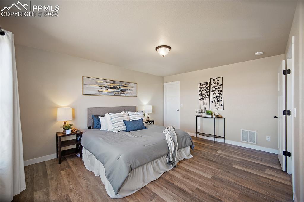 Image 25 of 39: Master Bedroom