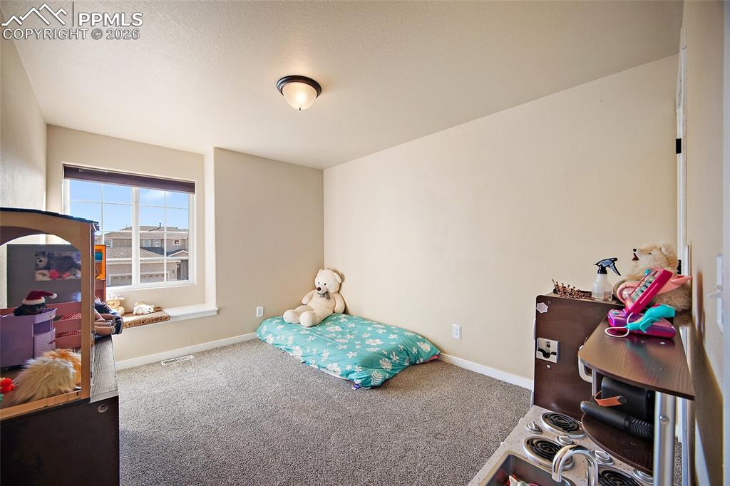 Image 29 of 39: Bedroom