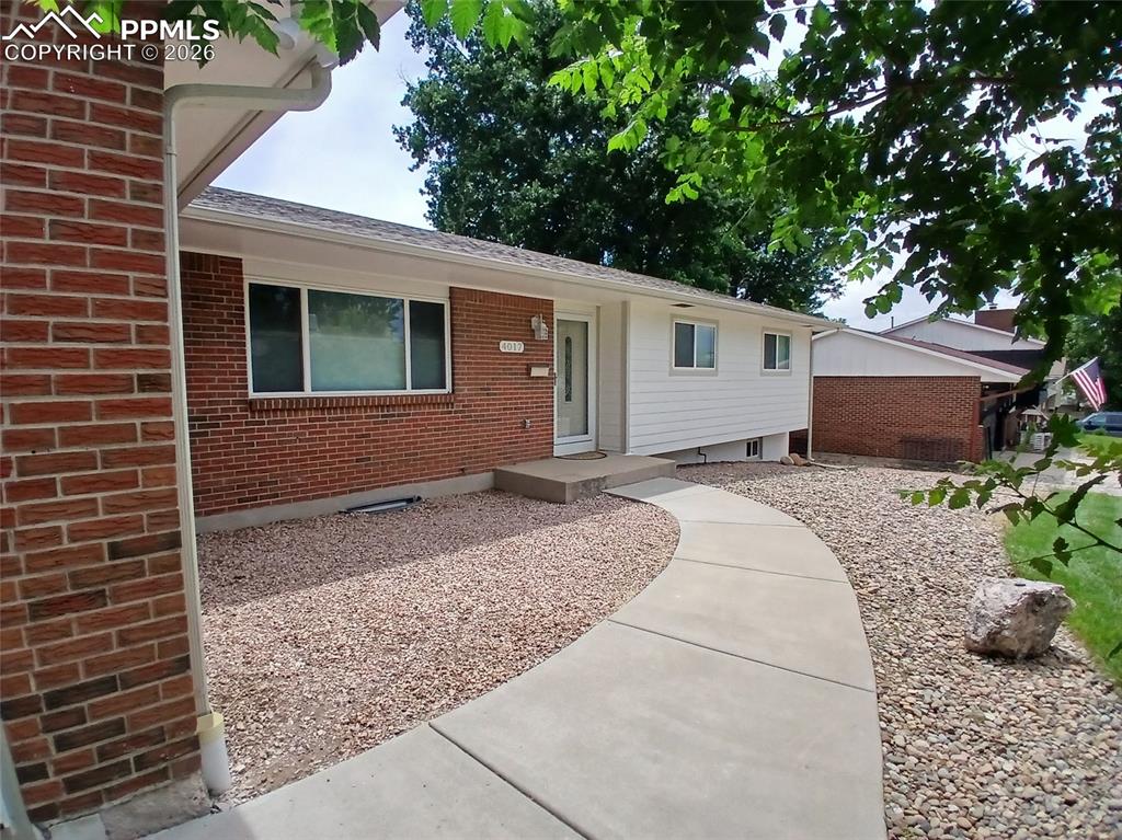 Image 4 of 49: Front entry sidewalk