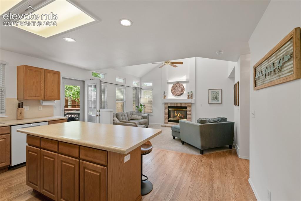 Image 11 of 50: Seating island with lots of storage space.