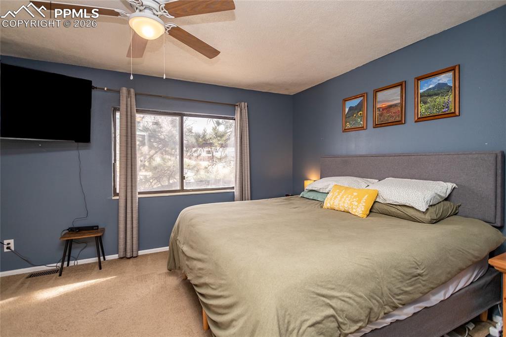 Image 24 of 30: Master Bedroom