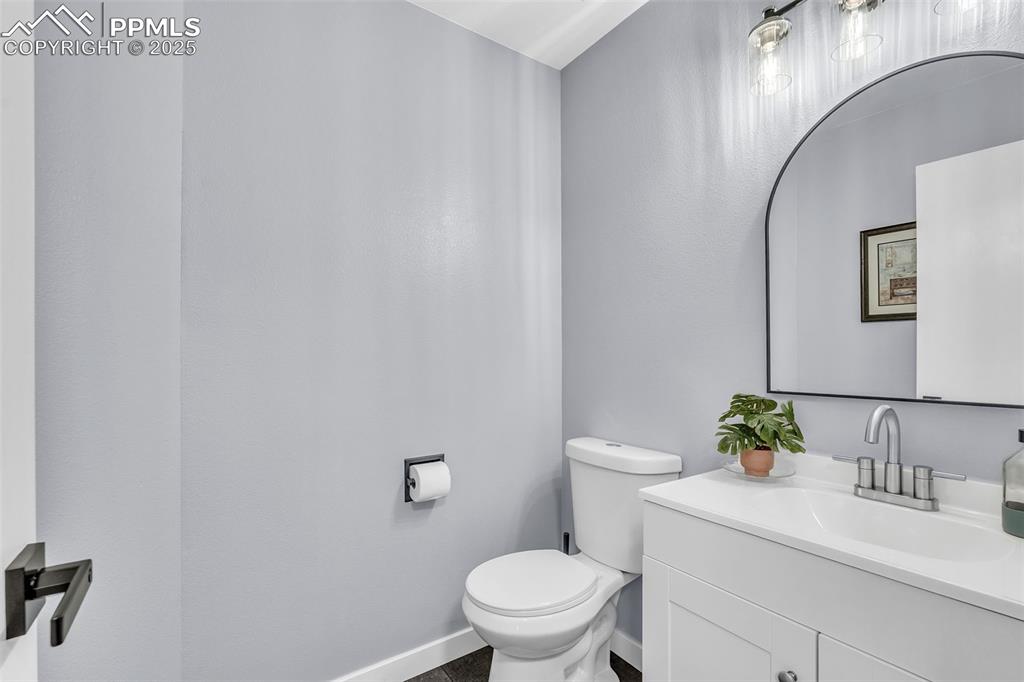 Image 10 of 26: Bathroom with vanity and toilet
