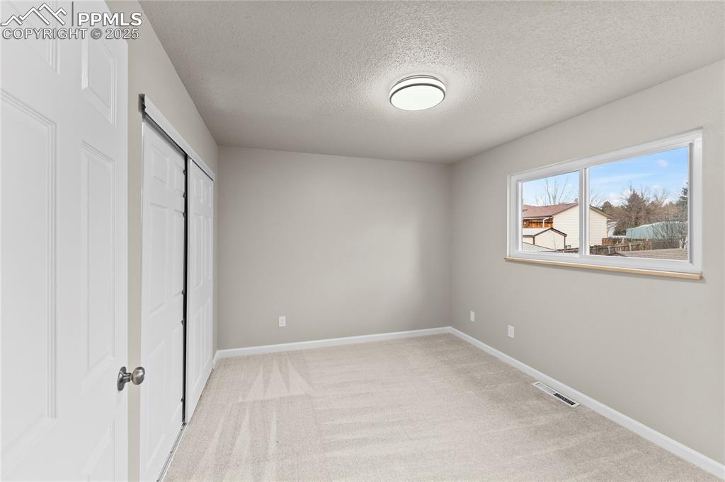 Image 15 of 29: Bedroom