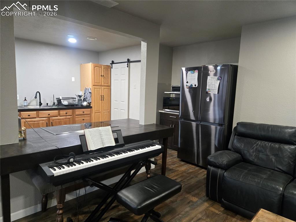 Image 10 of 22: Breakfast Bar behind of Piano 