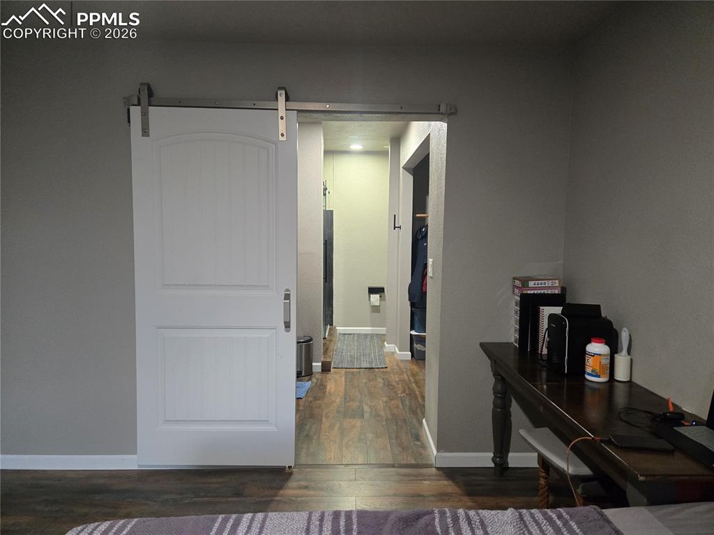 Image 12 of 22: View from Primary bedroom to en-suit bath