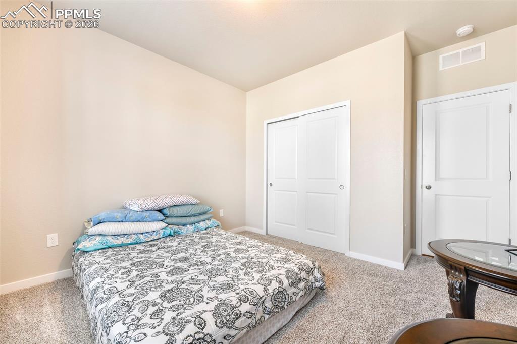 Image 22 of 50: Bedroom