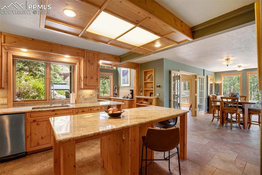 Image 26 of 50: Knotty pine cabinetry