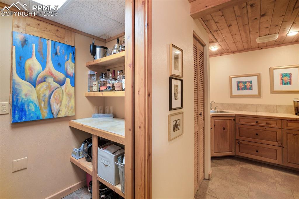 Image 32 of 50: 2nd refrigerator/storage; pocket doors