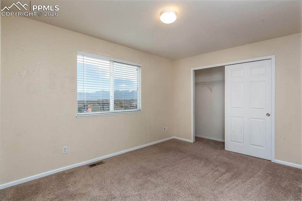 Image 20 of 28: Bedroom