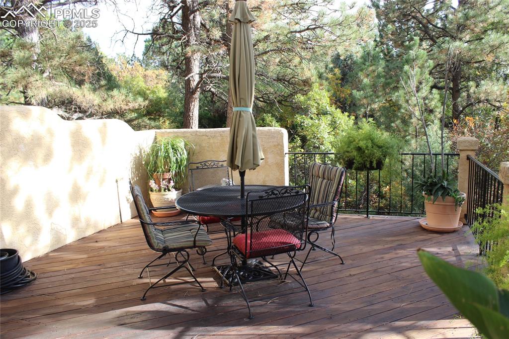 Image 14 of 41: Wooden deck featuring outdoor dining area