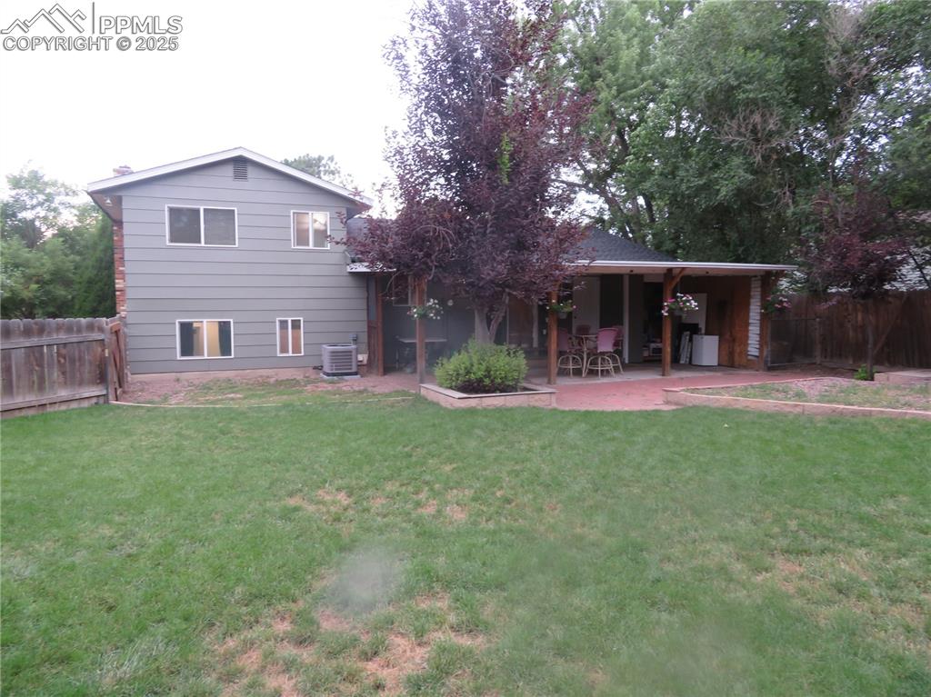 Image 10 of 39: Covered Patio